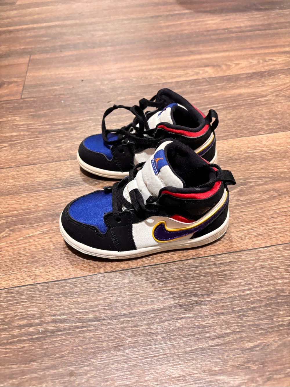 Nike Kids High-Top Sneakers in Blue, Black, White with Red and Gold Accents